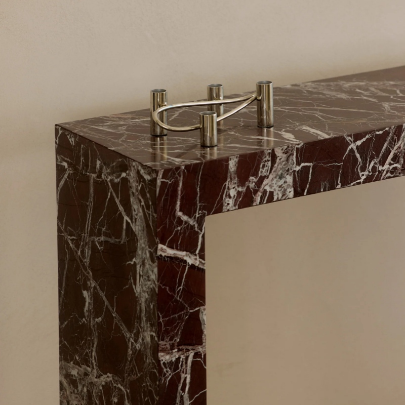 marble console table with metallic decor - modern interior accent piece